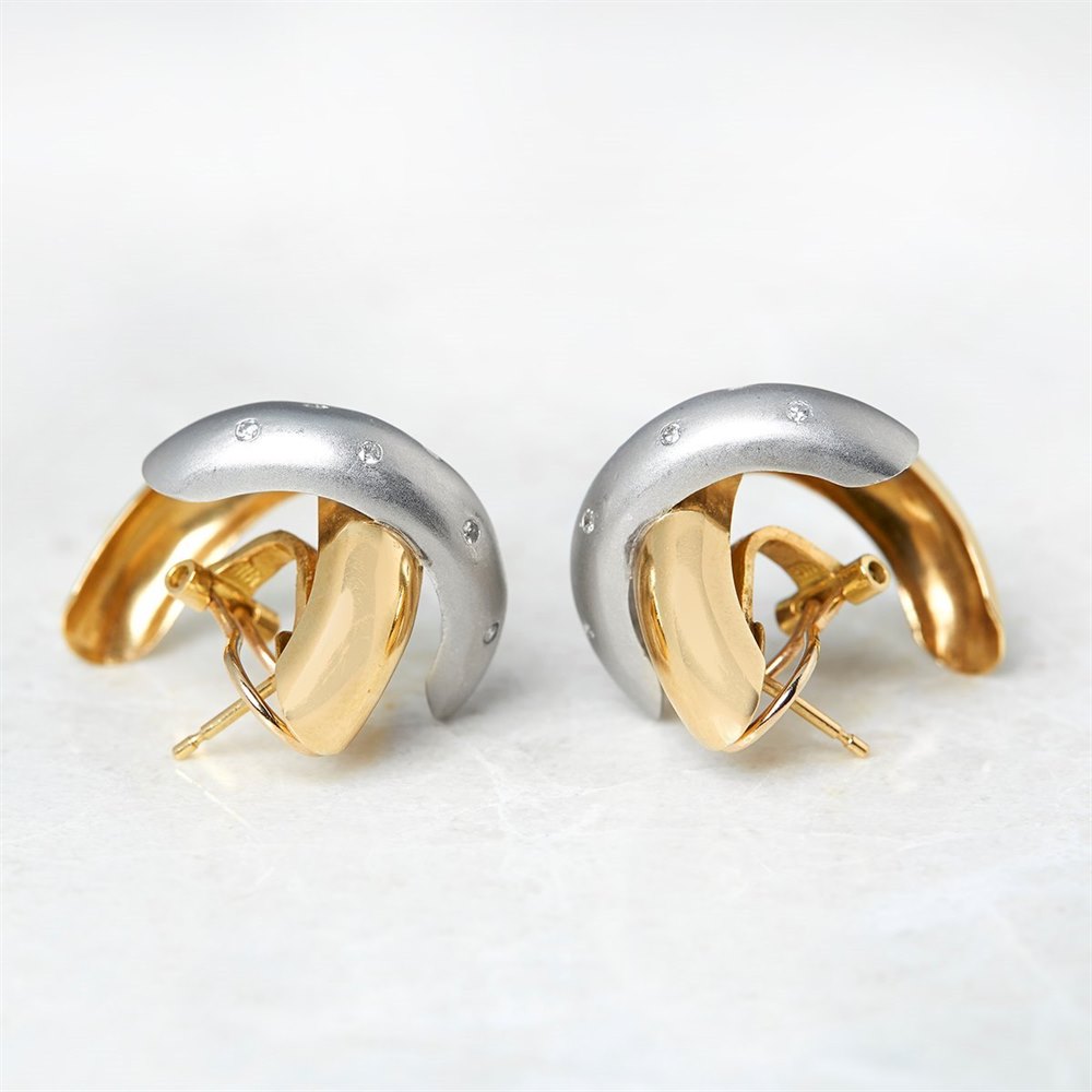 18k White & Yellow Gold, total weight 11.62 grams 18k White & Yellow Gold 0.20ct Diamond Crossover Earrings