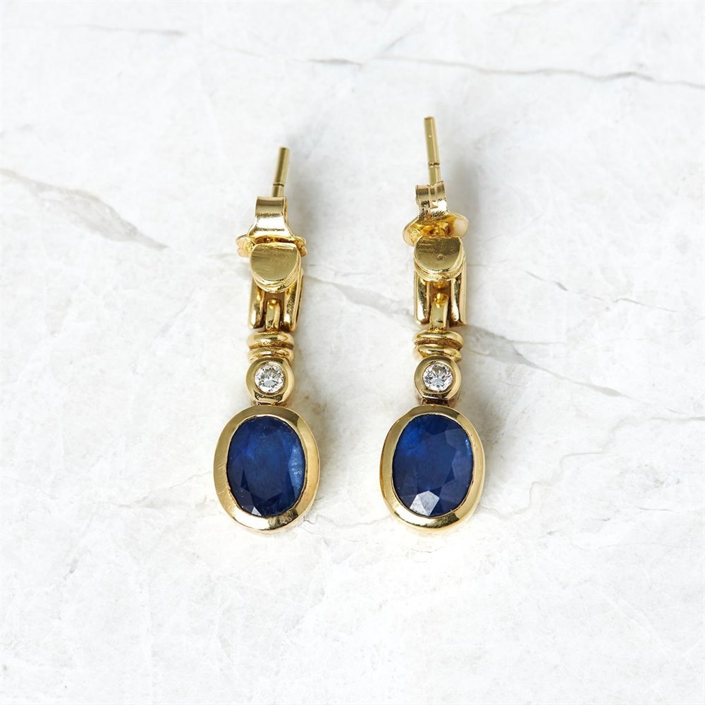 18k Yellow & White Gold - total weight 87.58 grams 18k Yellow & White Gold 12.48ct Sapphire & 1.24ct Diamond Necklace, Bracelet & Earrings Suite