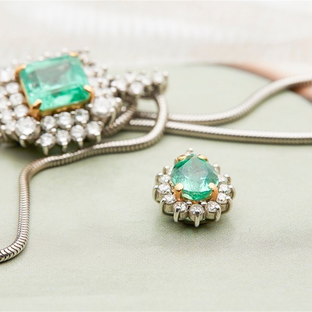 18k White & Yellow Gold (the 2 4 claw settings holding the emeralds are 18k Yellow Gold) 18k White Gold 3.50ct Colombian Emerald & 3.00ct Diamond Necklace