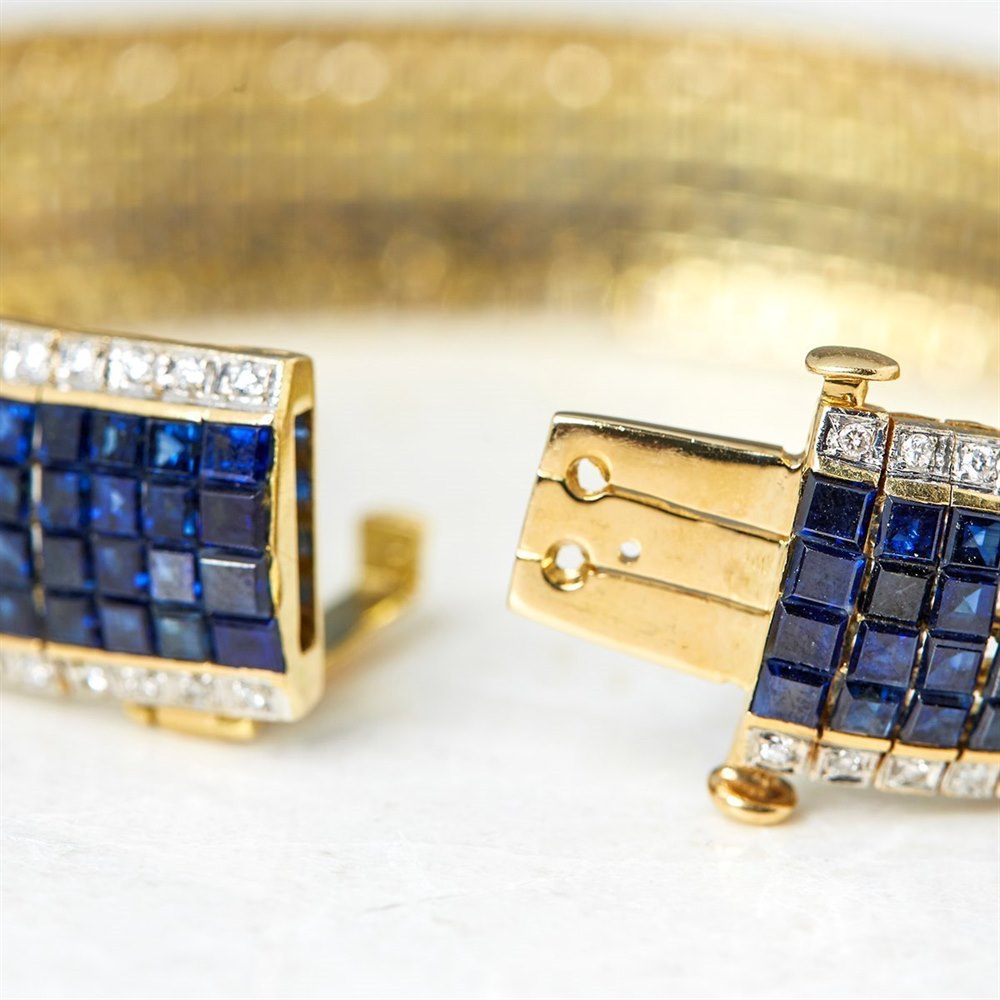 18k Yellow Gold, total weight - 43.07 grams 18k Yellow Gold 30.80ct Sapphire & 1.54ct Diamond Bracelet