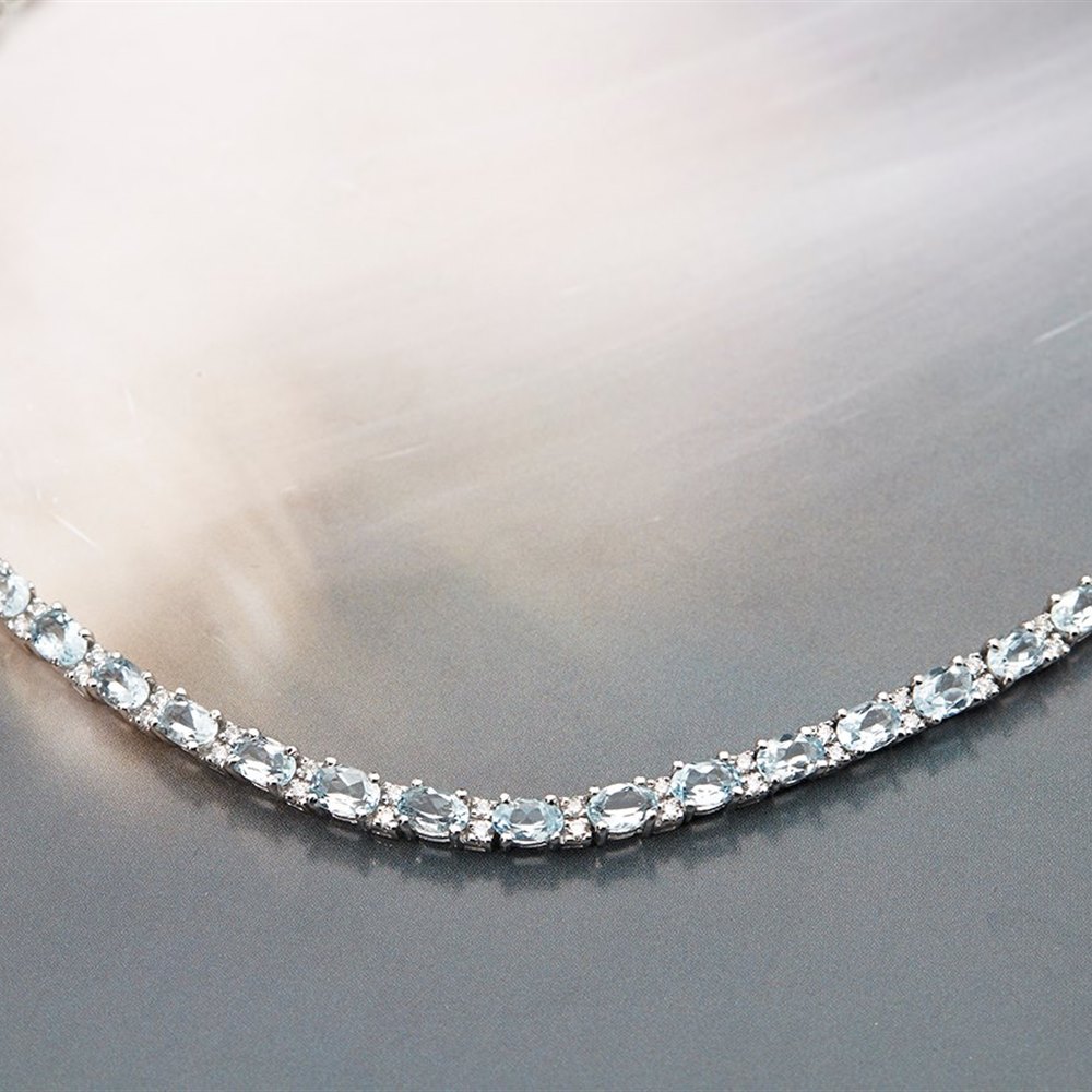 18k White Gold, total weight 69.9 grams 18k White Gold Aquamarine & Diamond Bracelet, Earrings & Necklace Suite