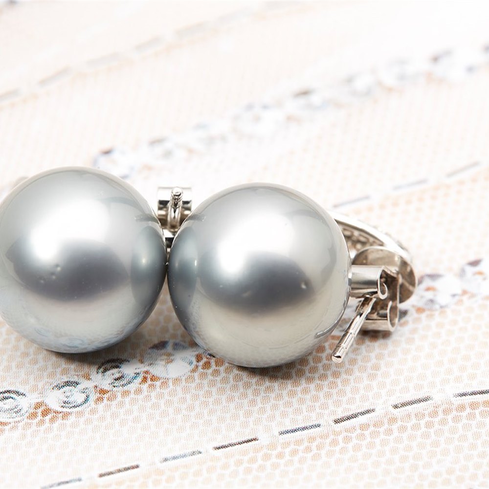 18k White Gold - total weight 8.10 grams 18k White Gold Tahitian Pearl and 0.25ct Diamond Earrings