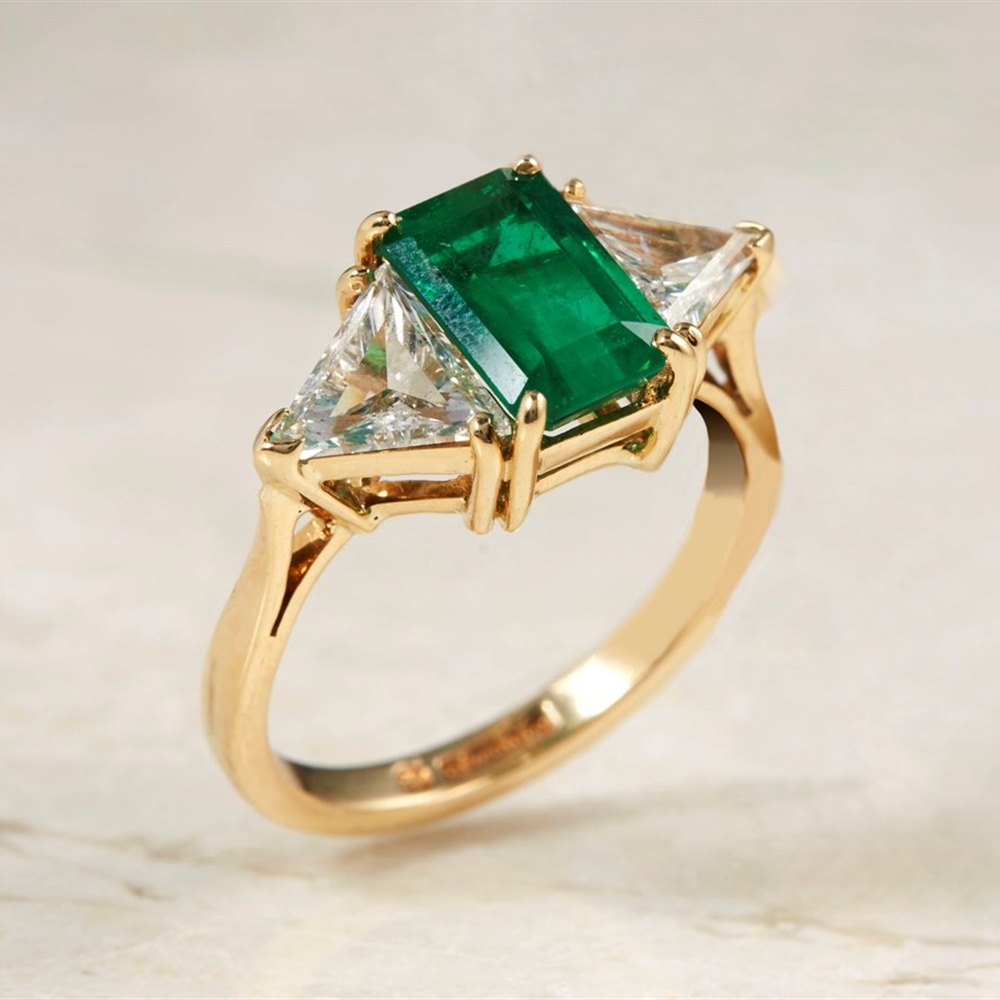 18k Yellow Gold - total weight 4.42 grams 18k Yellow Gold 1.25ct Emerald & 1.00ct Diamond Ring
