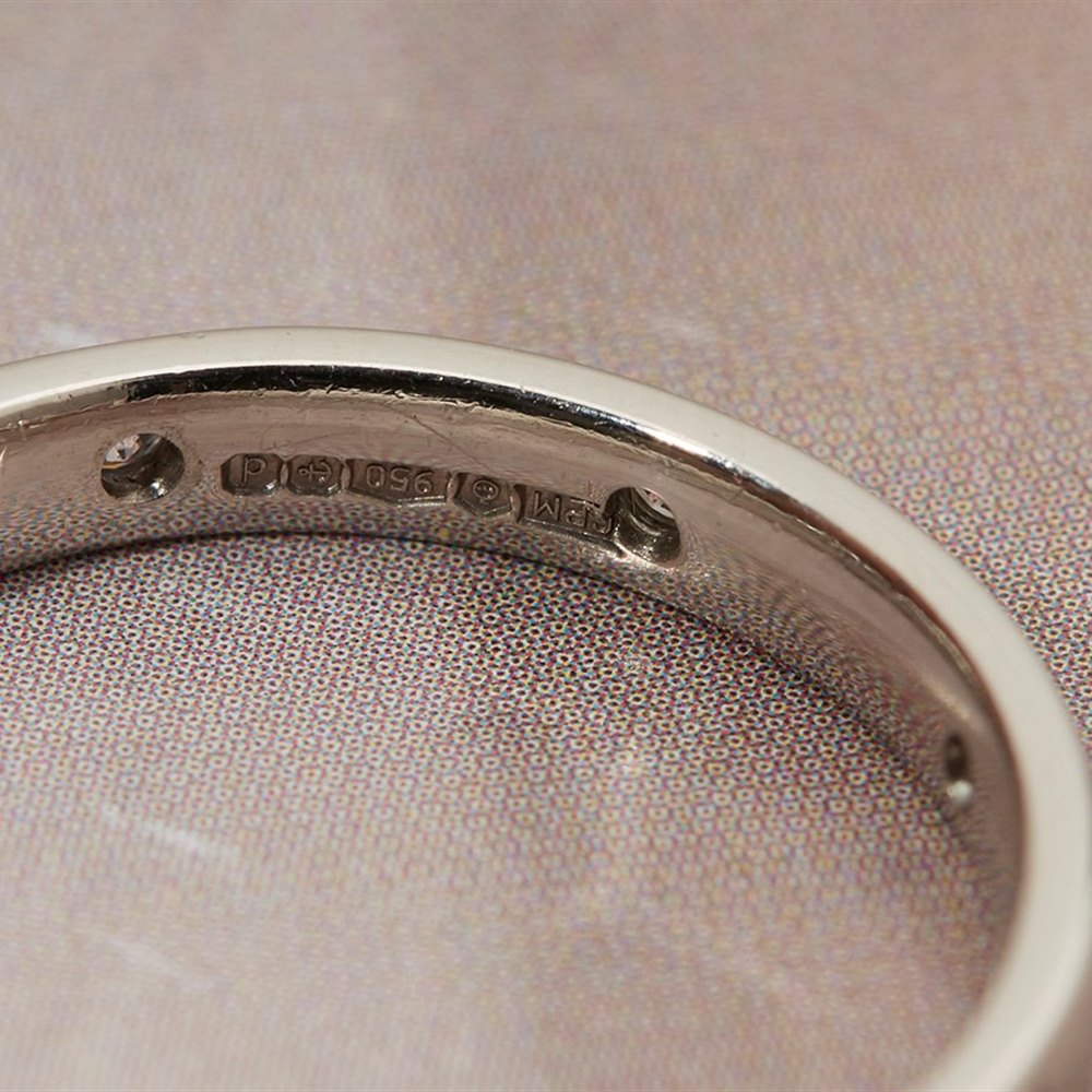 Platinum - total weight of Engagement Ring - 6.21 grams. Total weight of Wedding Band - 4.26 grams.  Platinum Diamond Engagement & Wedding Ring Set