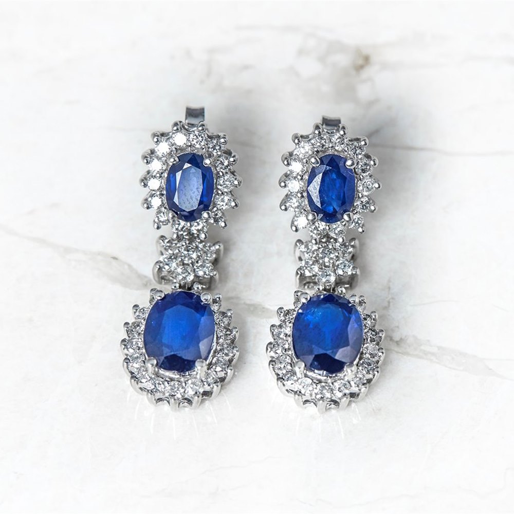 18k White Gold - total weight 7.43 grams 18k White Gold 5.60ct Sapphire & 1.20ct Diamond Drop Earrings