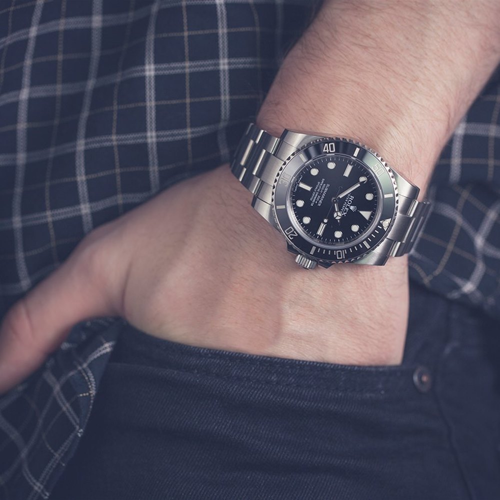 rolex 114060 on wrist