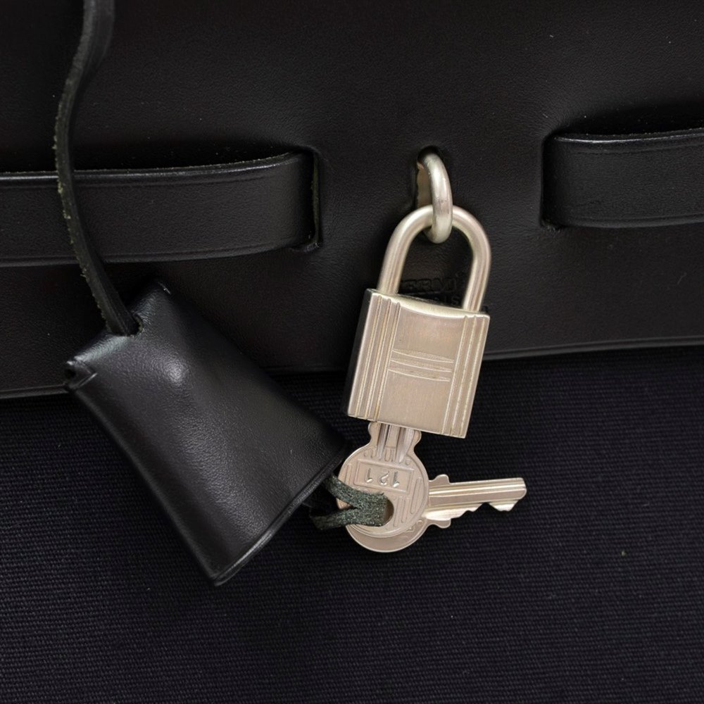 hermes herbag lock