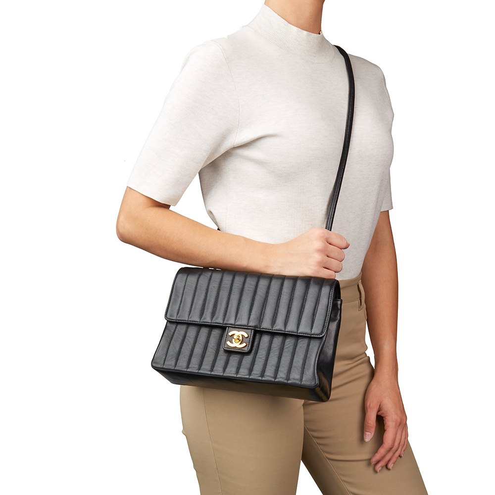 Chanel vertical quilted bag clearance