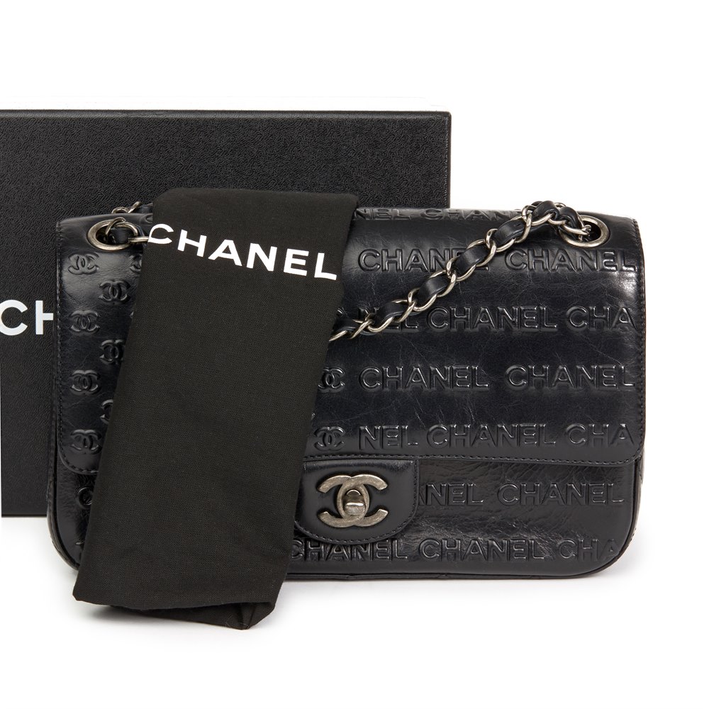 chanel calfskin quilted logo flap black