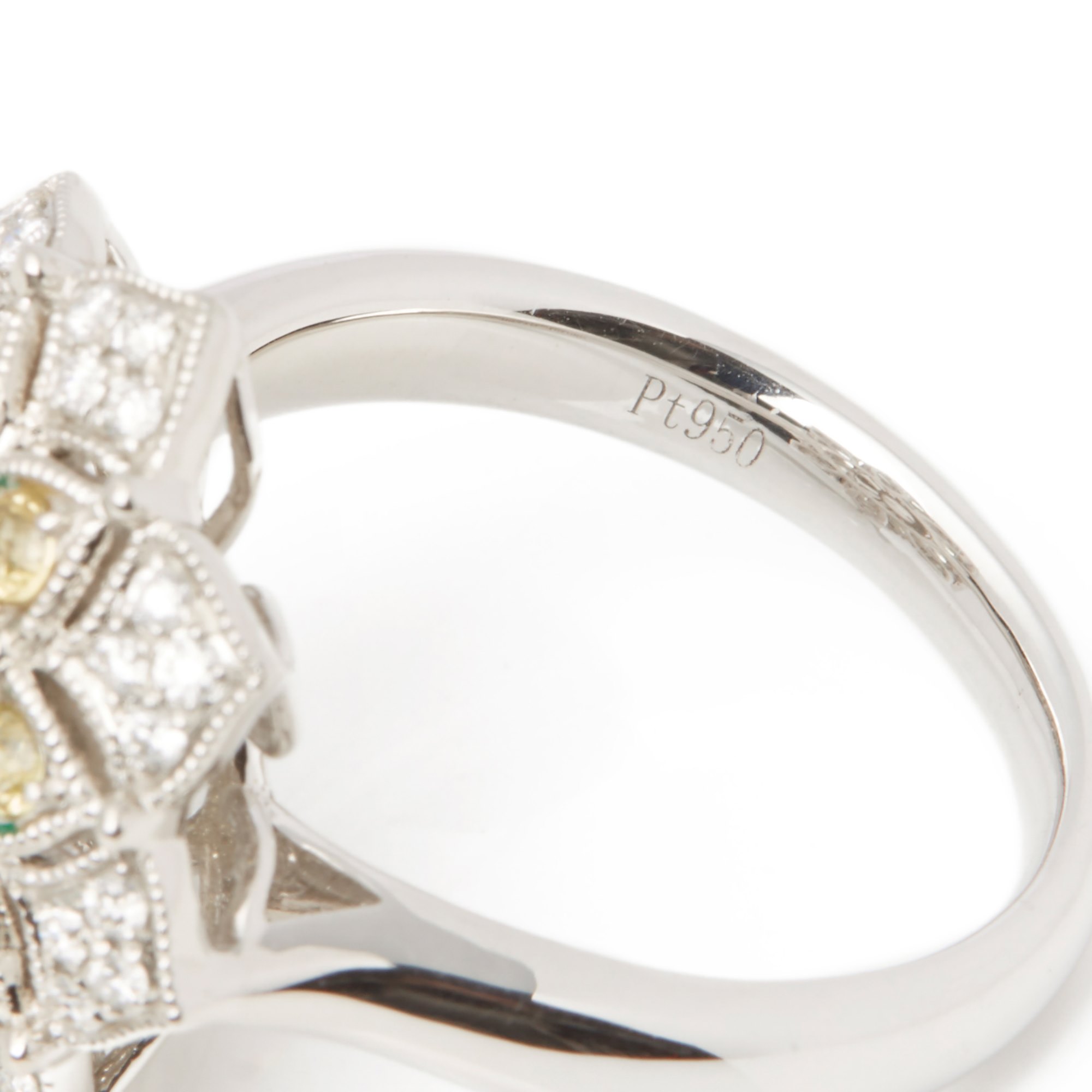 David Jerome Platinum Emerald, Diamond and yellow Sapphire Cluster Ring