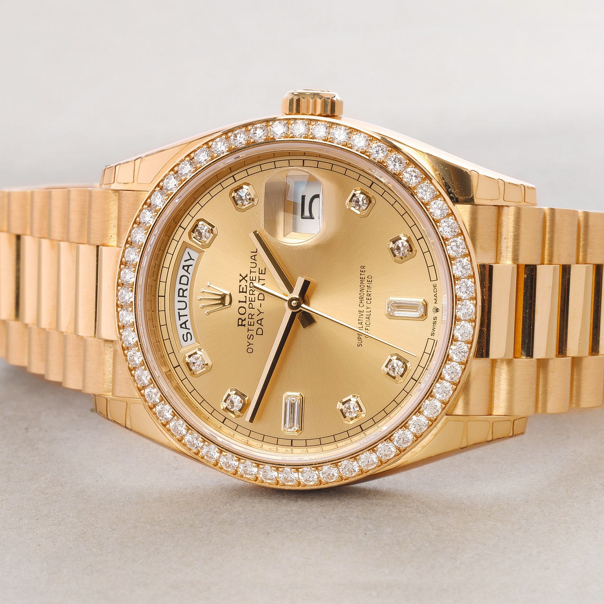 rolex day date gold diamond