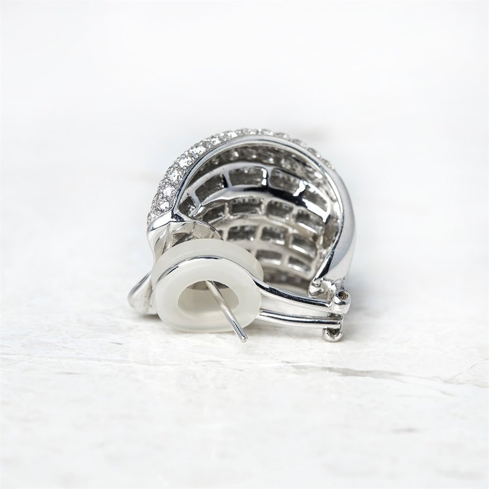 18k White Gold, total weight - 22.55 grams 18k White Gold 12.00ct Baguette & Round Cut Diamond Earrings