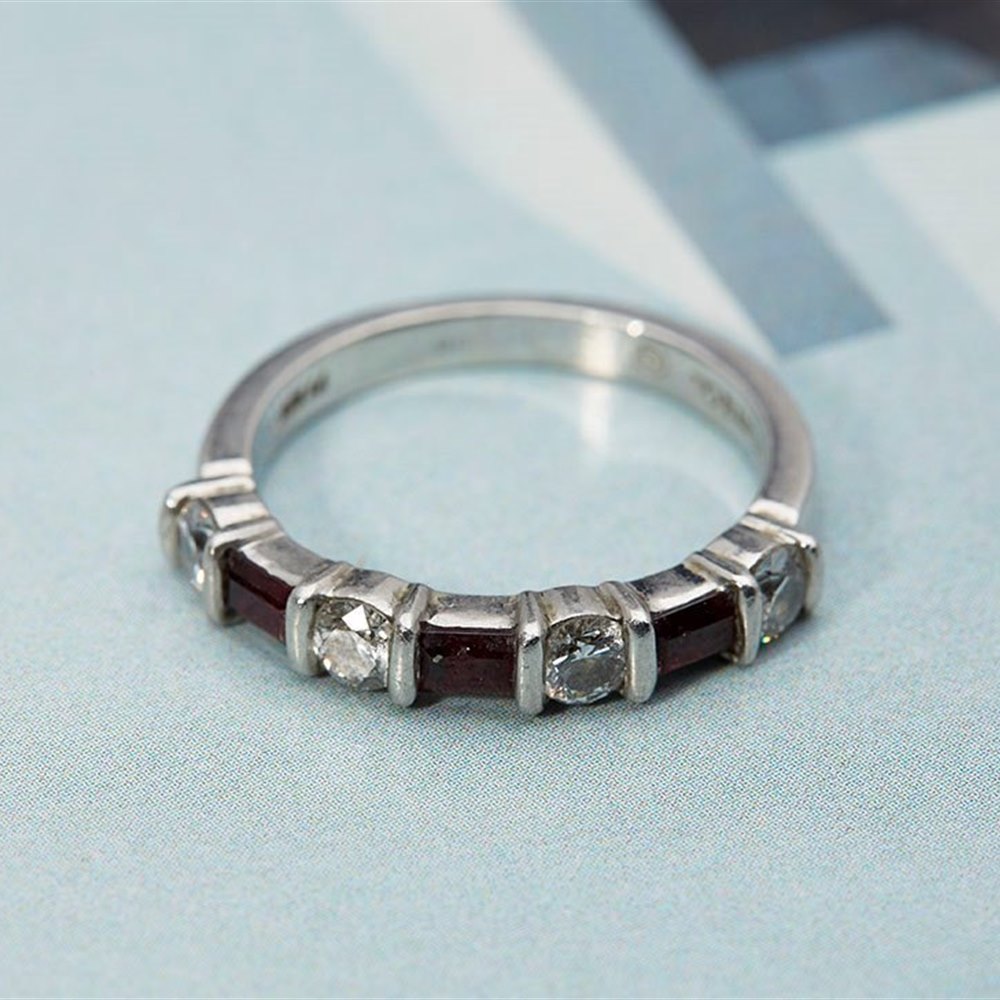 Tiffany Platinum Brilliant Cut Diamond & Emerald Cut Ruby ring (ruby's 0.45cts + Diamonds 0.80cts)