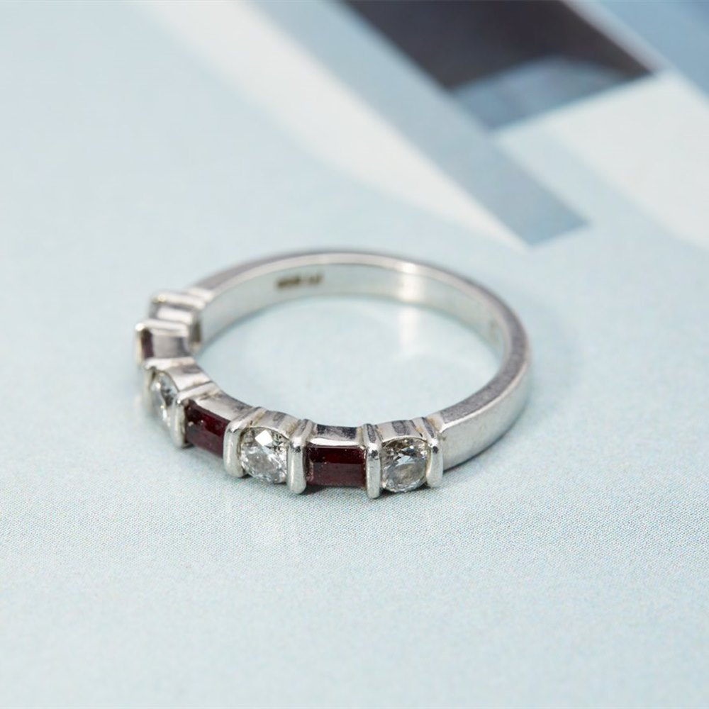Tiffany Platinum Brilliant Cut Diamond & Emerald Cut Ruby ring (ruby's 0.45cts + Diamonds 0.80cts)